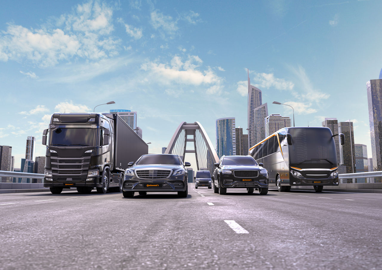 Different vehicle types crossing a bridge