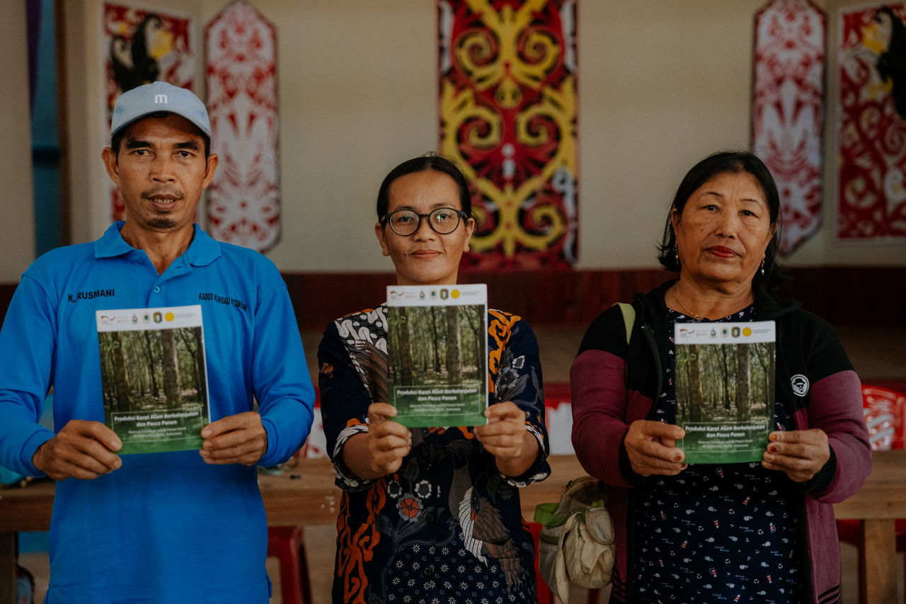 Farmers are trained in sustainable cultivation practices and improved techniques, such as how to cut trees to maximize rubber yield.