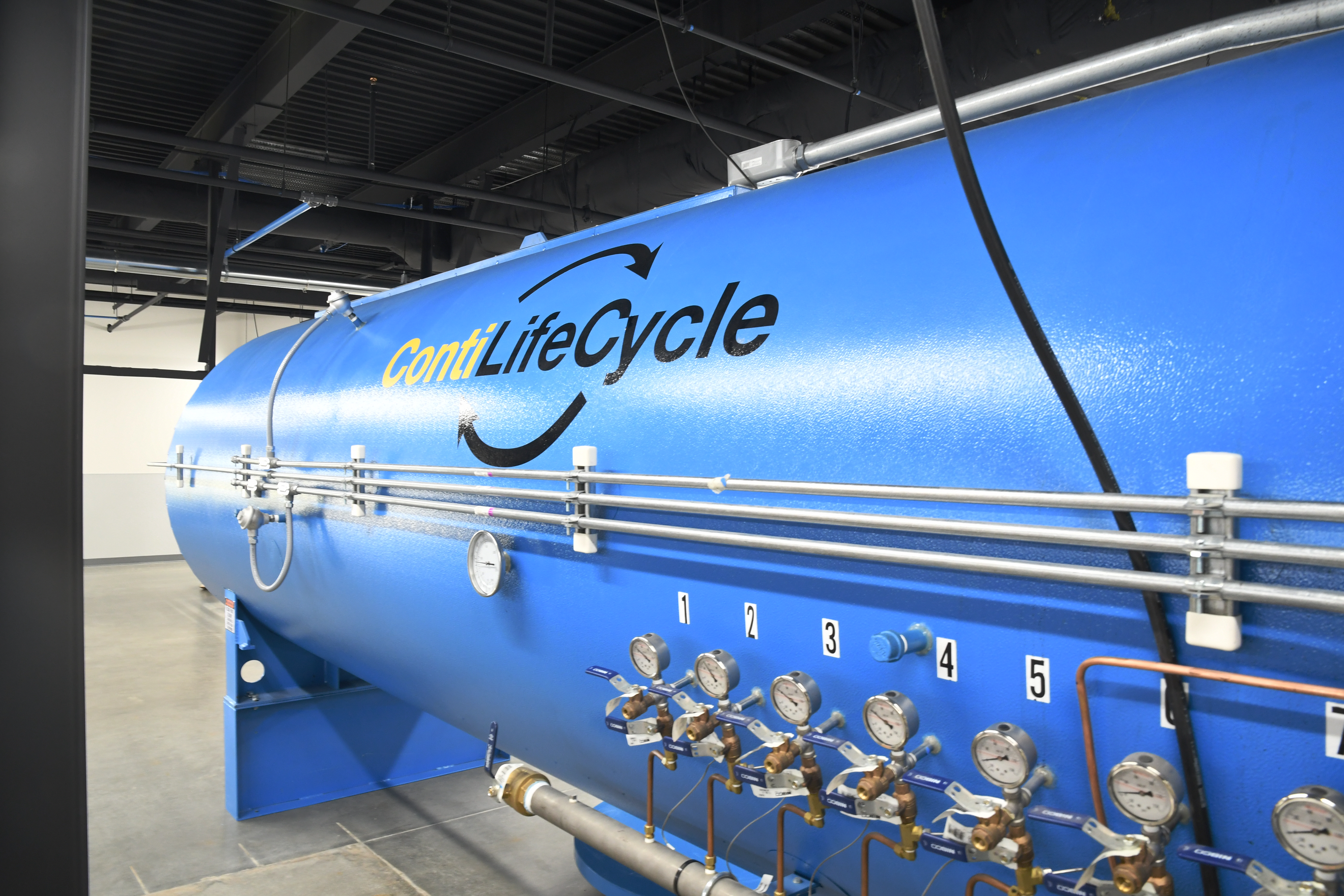 An image of the curing station at Continental's new Retread Solutions Development Center. Curing is where vulcanization happens; requiring temperature, pressure, and time to create a chemical reaction to finish the retread.