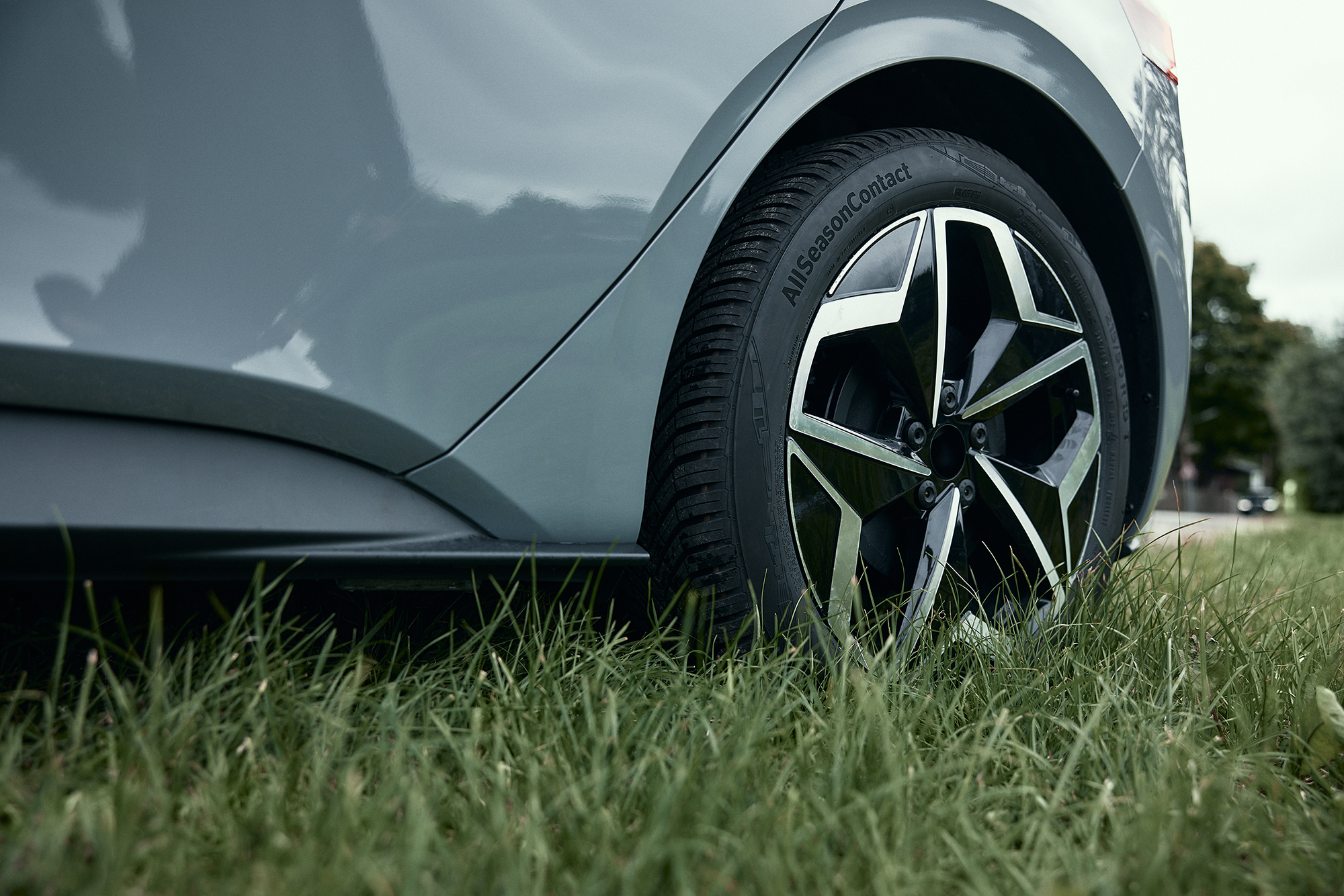 Details of the tread of an all-season Continental tire with branding visible