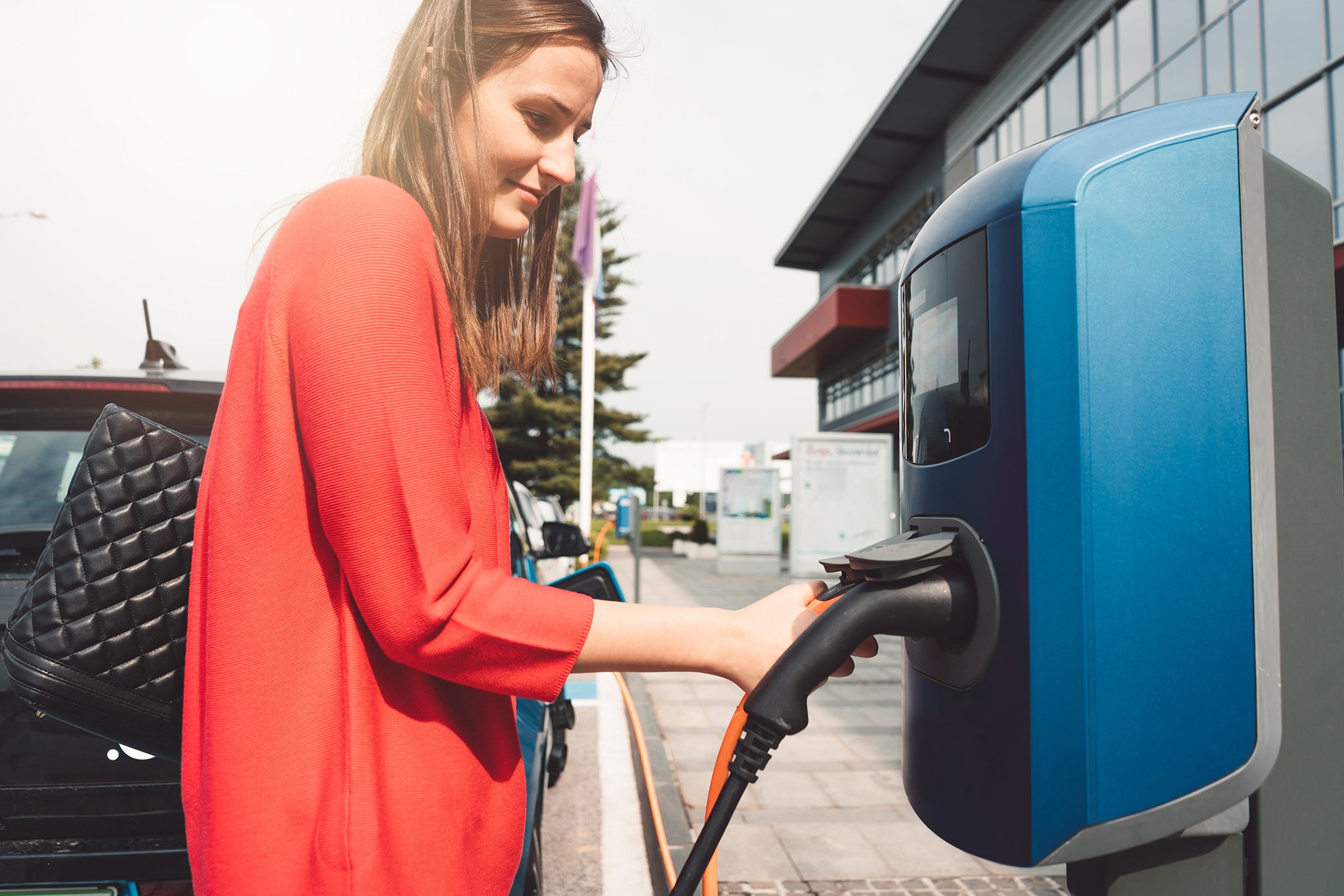 Woman and her electric car