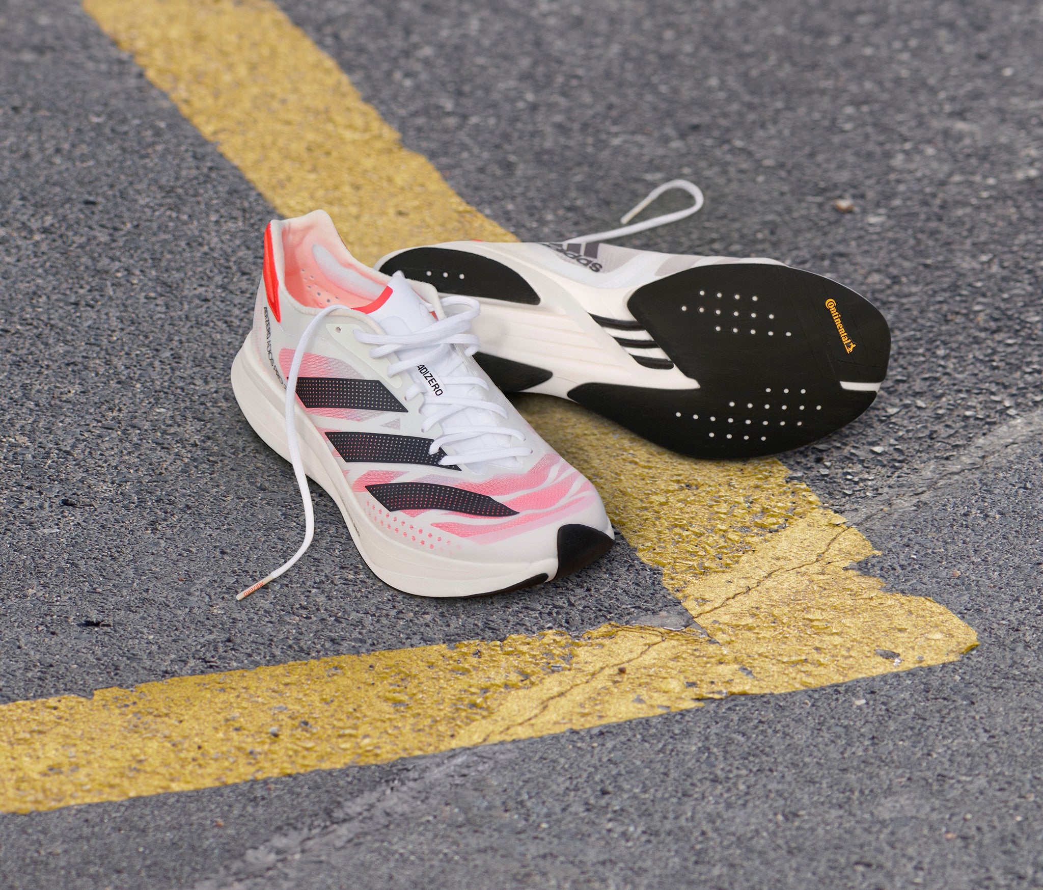 Adidas running shoes adizero Pro on the street.