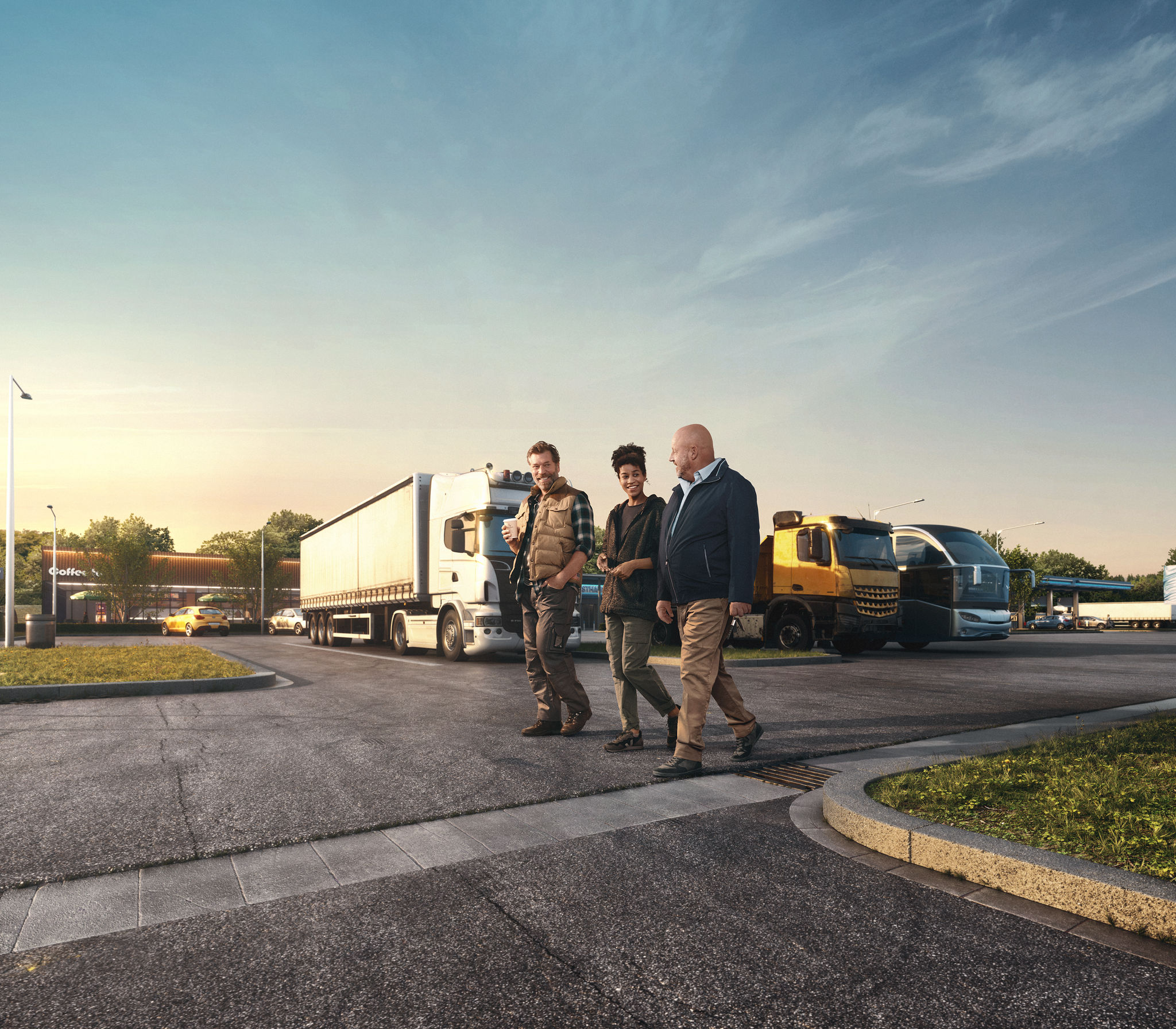 Three persons walking at a truck stop.