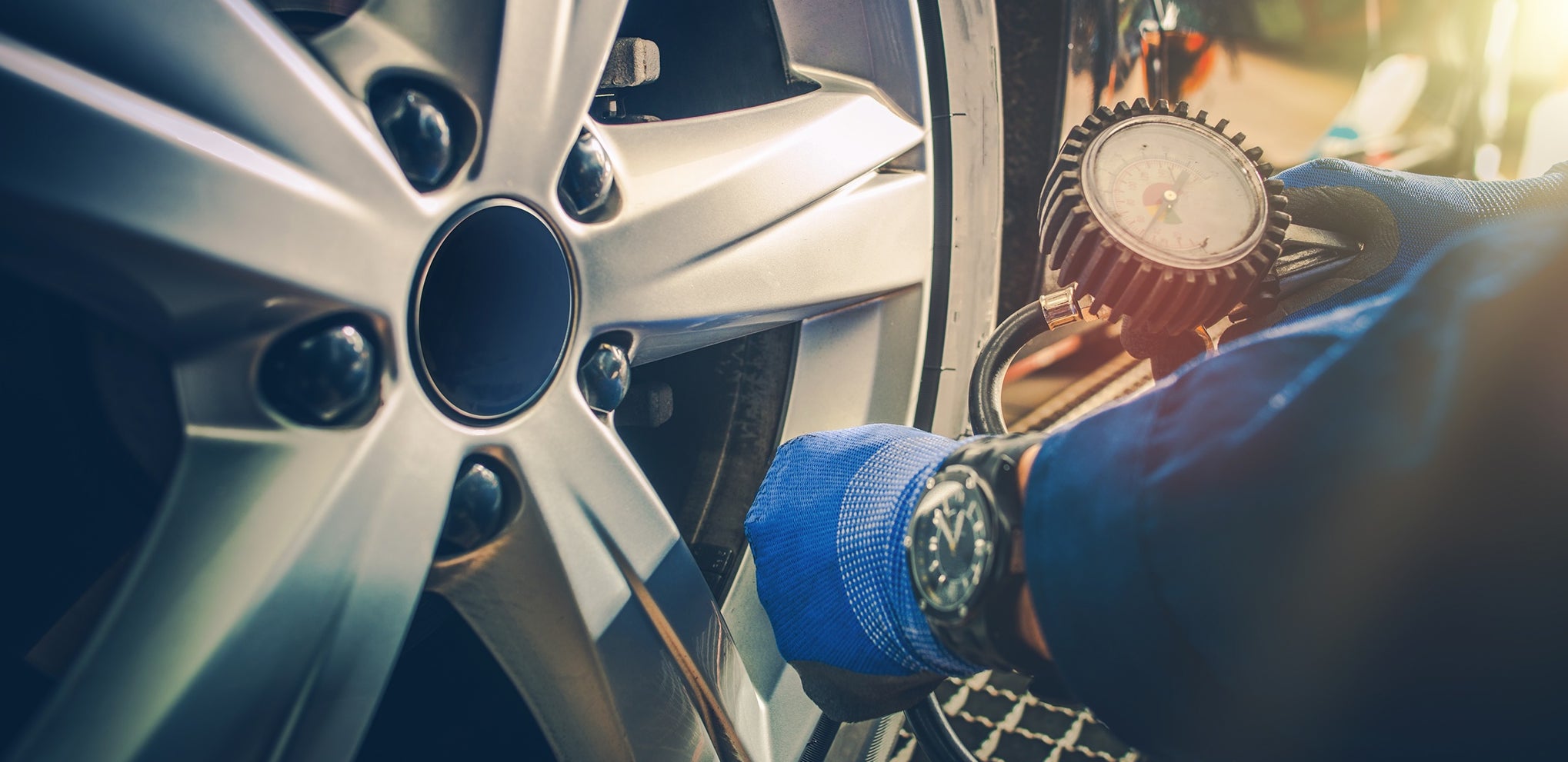 Car Tire Pressure Check in the Auto Service Garage.