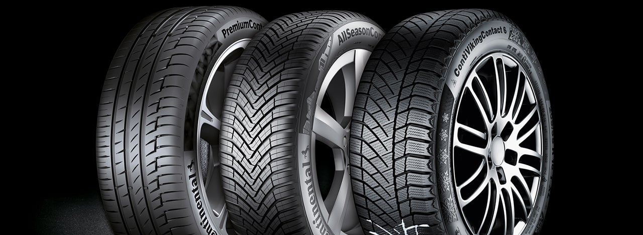 Tire types Three Continental tires on black background.