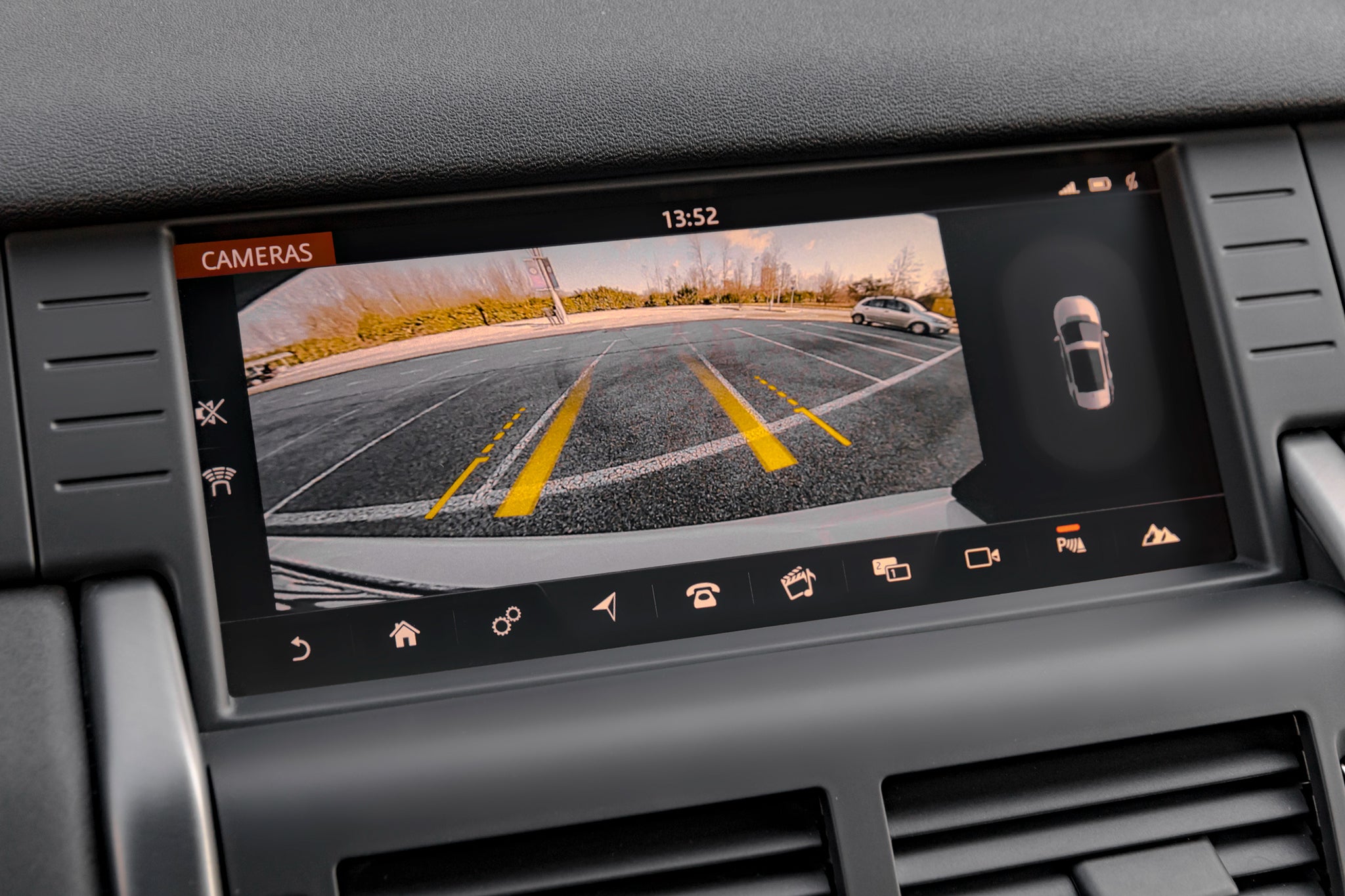 Close ups hot of modern car rear view parking camera display on the dashboard.