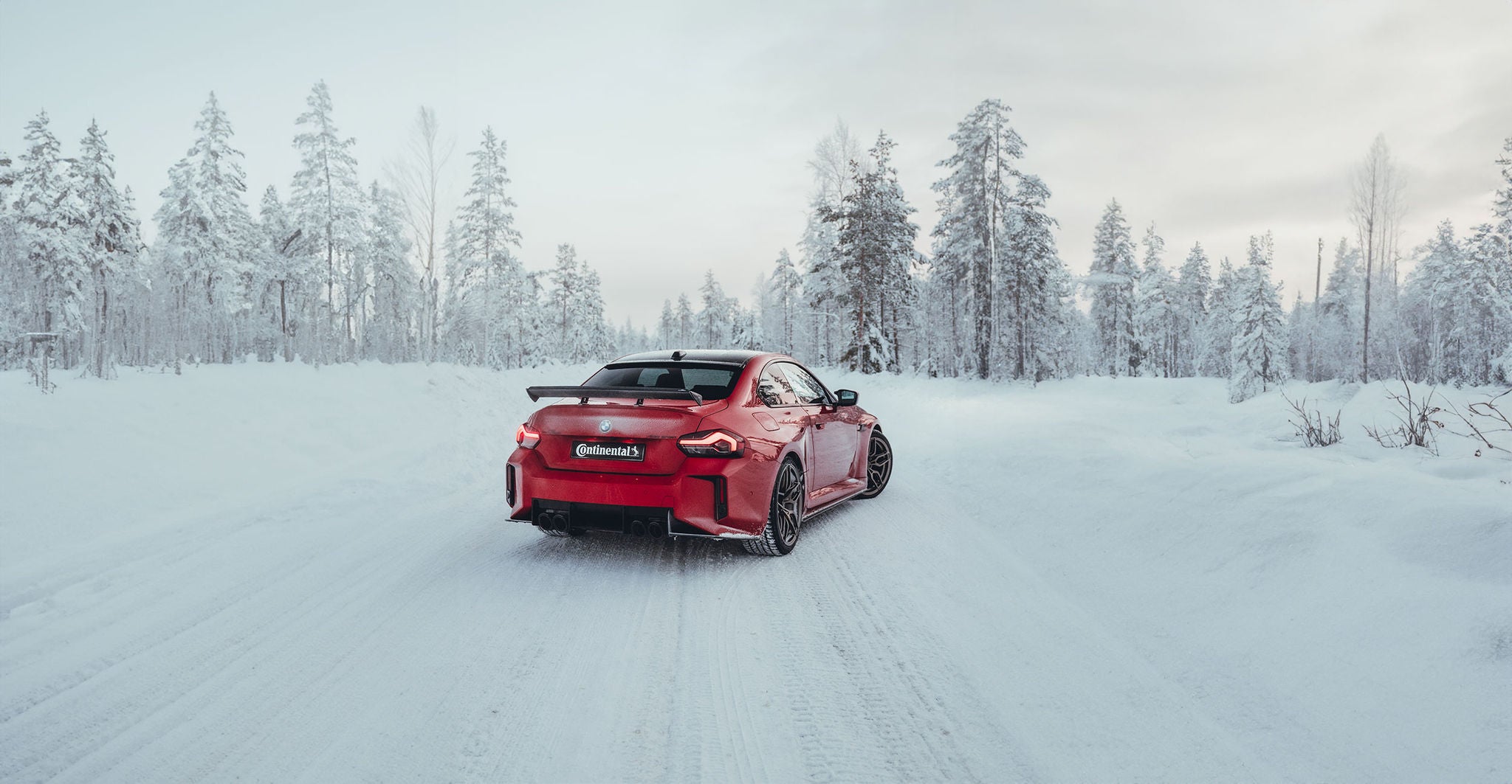 Car in the Snow at Continental'sWinter High Performance Event 2024