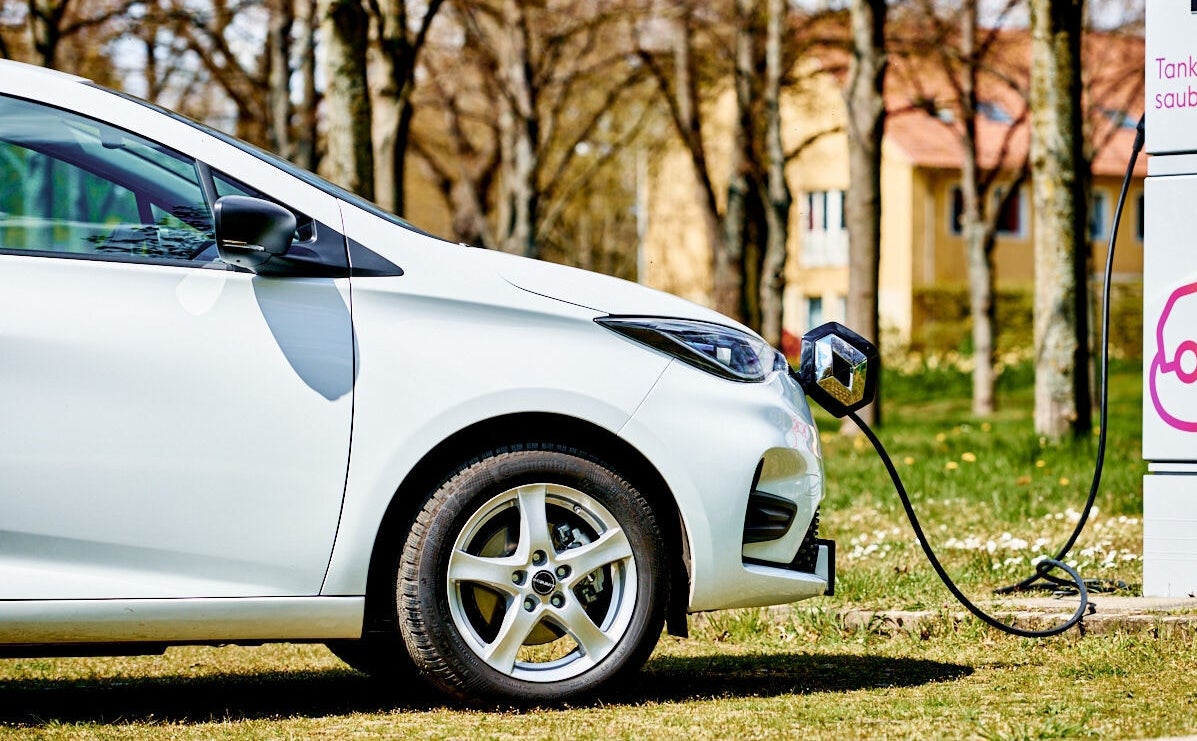 Electric car being charged