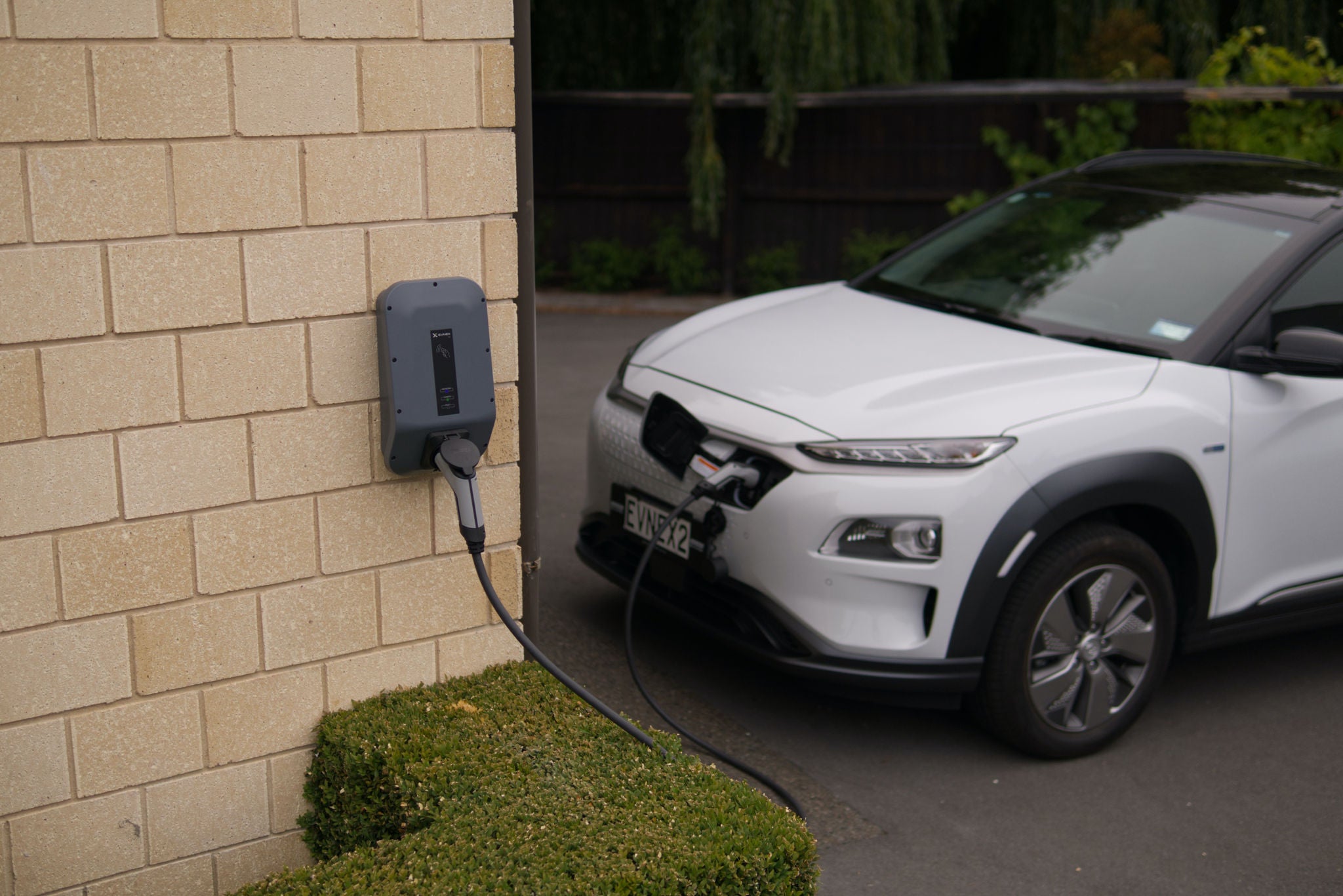 Electric car being charged