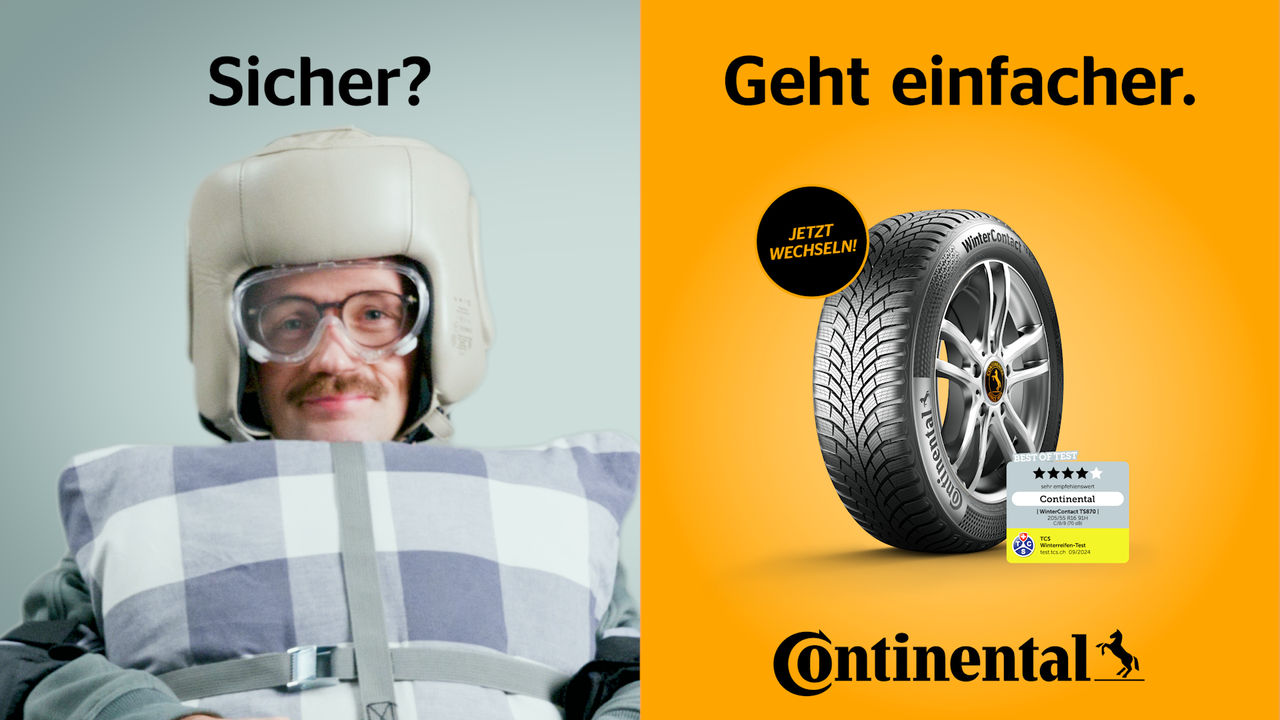 Mann mit Kissen als Sicherheitsmaßnahme hinter dem Autosteuer, daneben Winterreifen mit Testsiegel