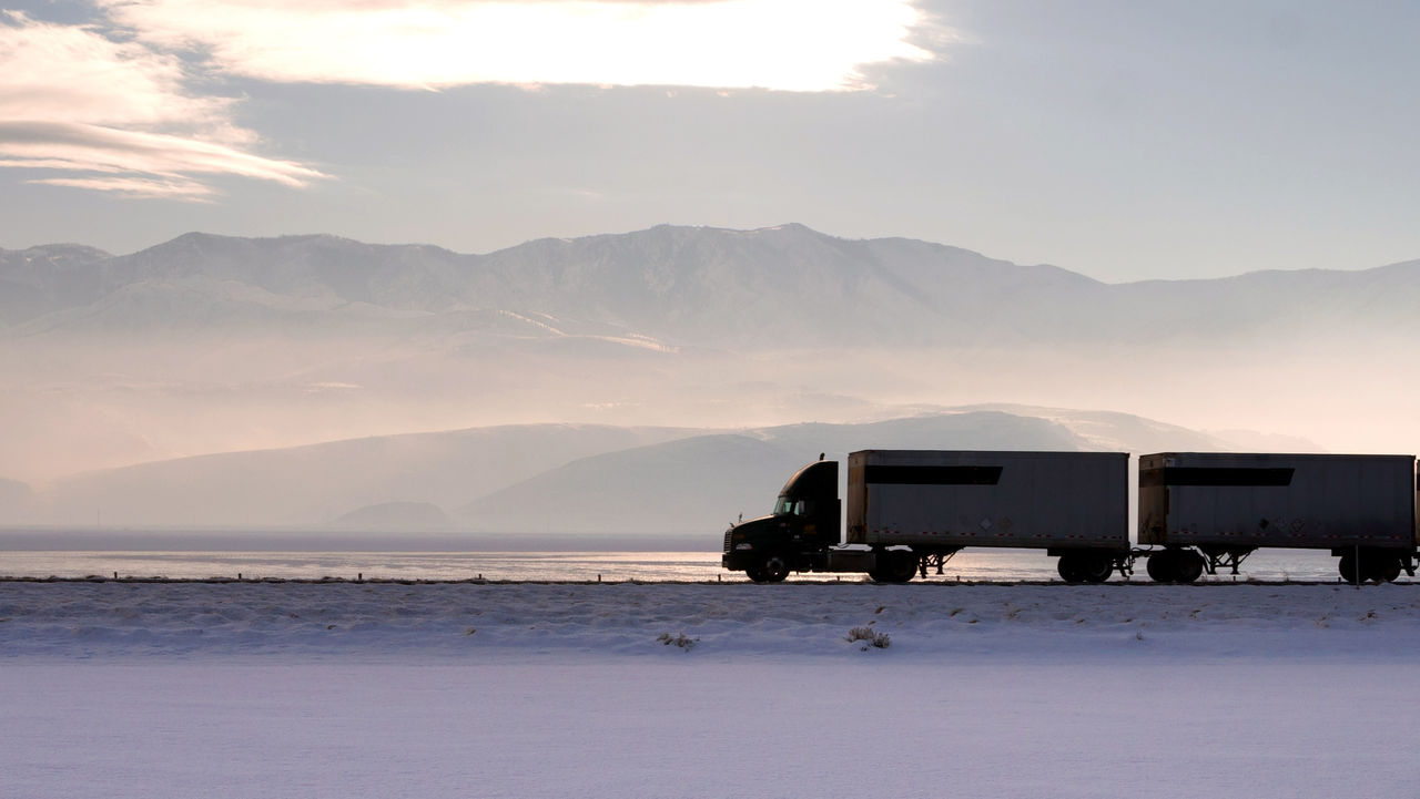 Semi Truck Travels Highway Over Salt Flats Freight Transport