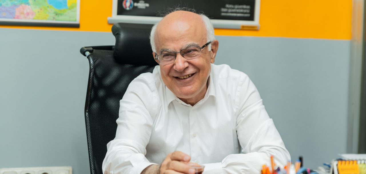 Nesa Lojistik owner Cumhur Şanlı at his desk.