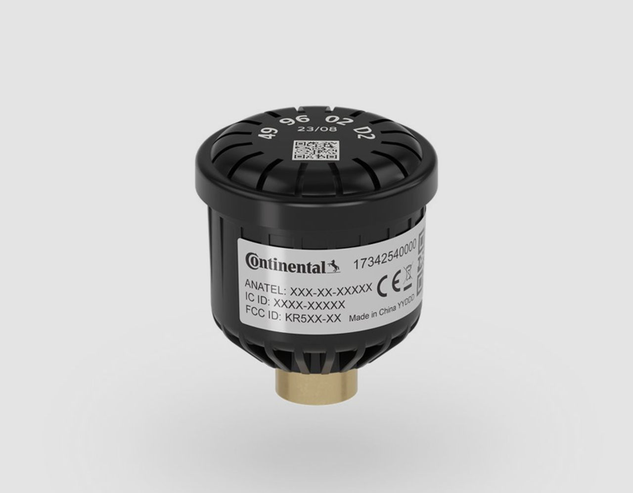 A Valve cap sensor device labeled “Continental” with a QR code and regulatory information, a brass connector at the bottom, and white numbering on top.