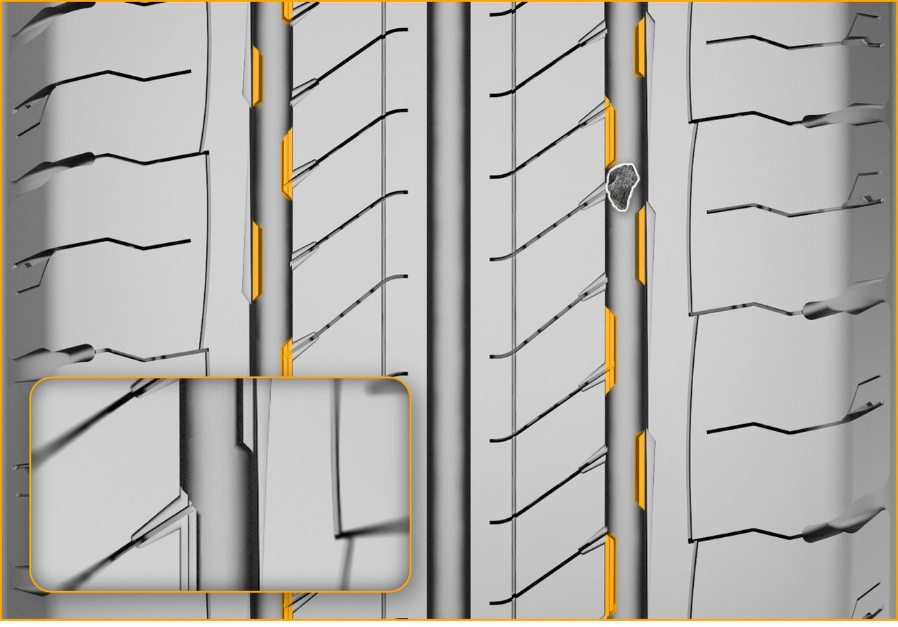 (Arte de la banda de rodadura de la llanta VanContact Ultra, que resalta las ranuras de la llanta que la protegen contra pinchazos al evitar que se alojen piedras)