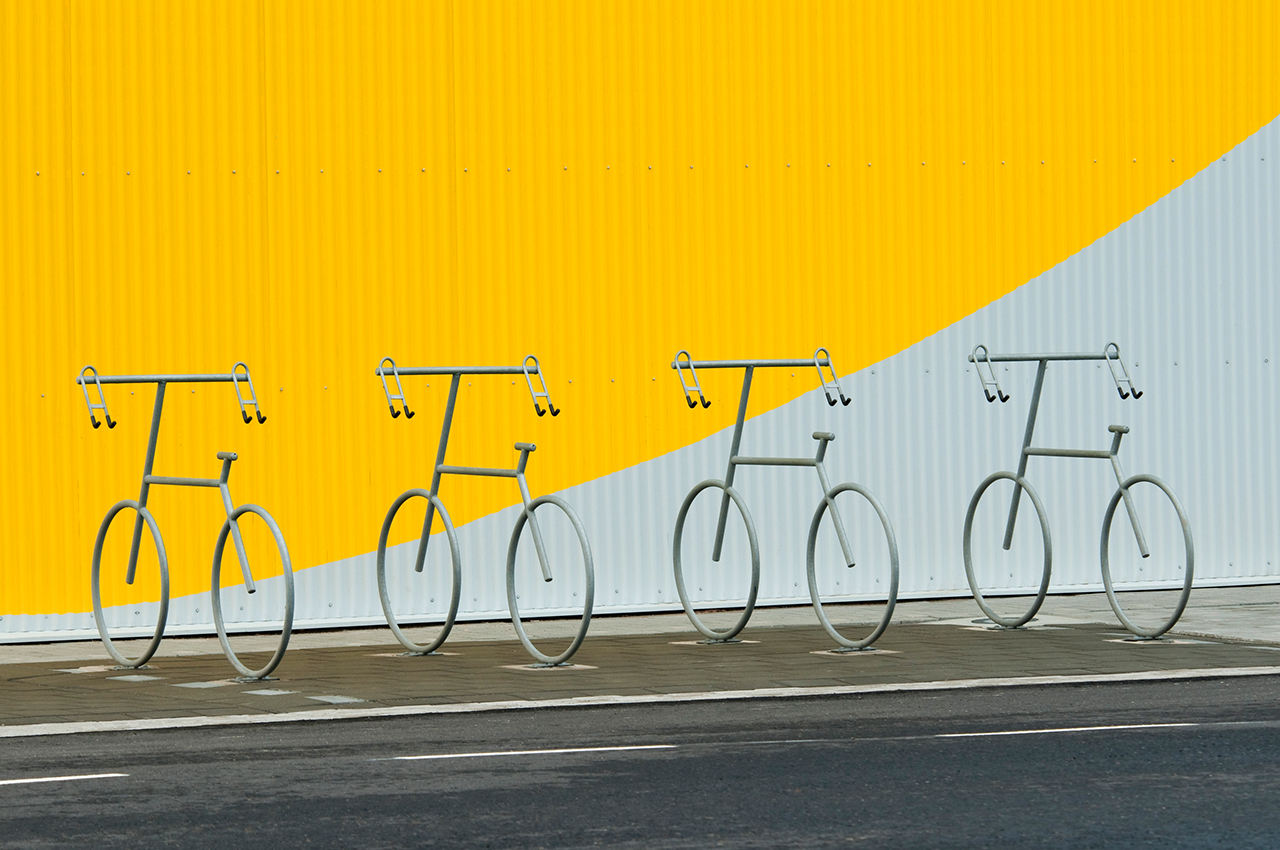 Four bicycle holders in a design of a bicycle.