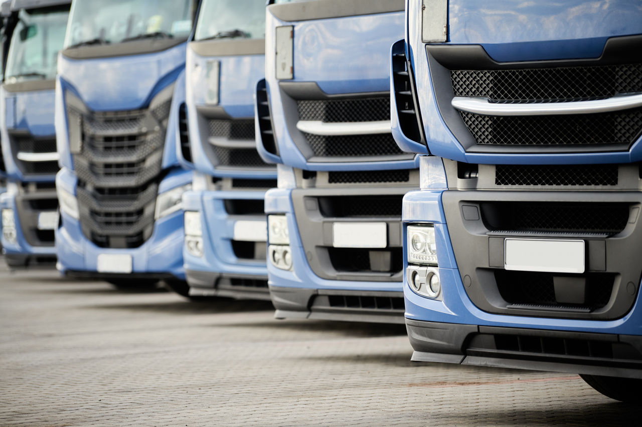 2133930469 Fleet of commercial lorry trucks in row. Logistics and transportation service; Shutterstock ID 2133930469; purchase_order: -; job: -; client: -; other: -