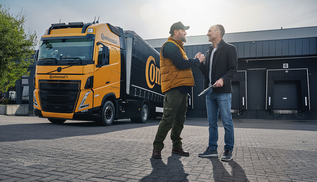 Truck driver and logistics manager at warehouse