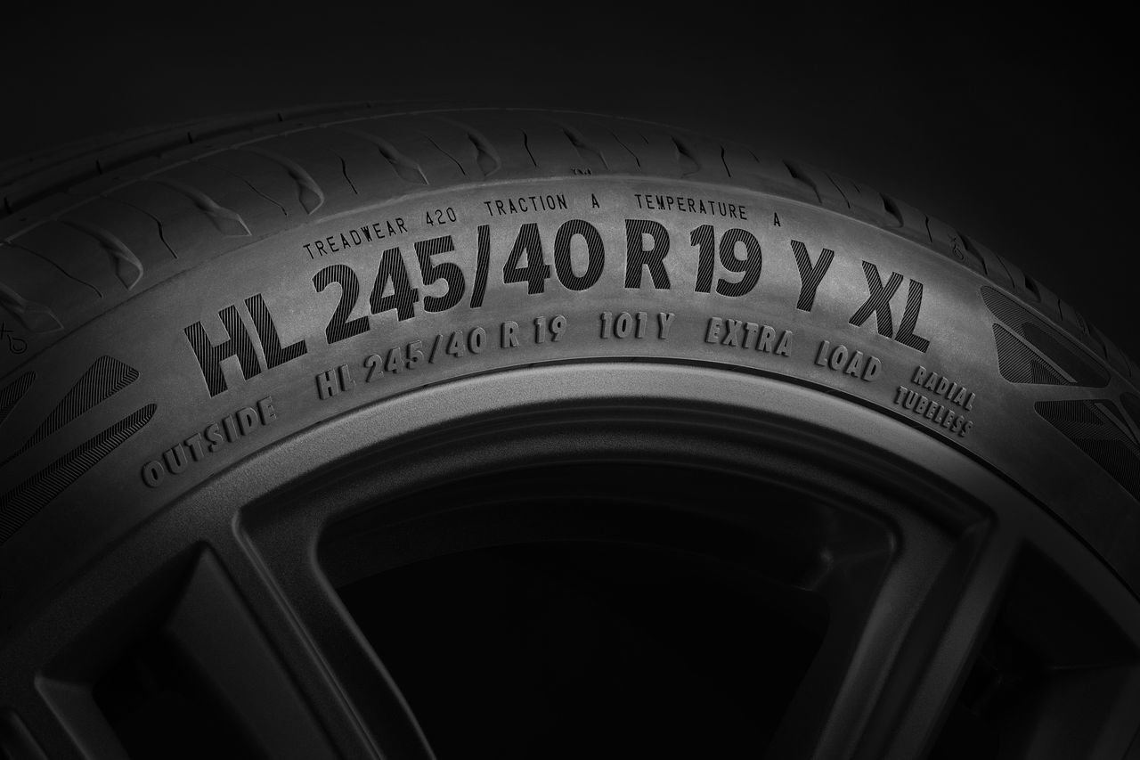 Close-up of a reinforced tire sidewall showing XL Extra Load marking