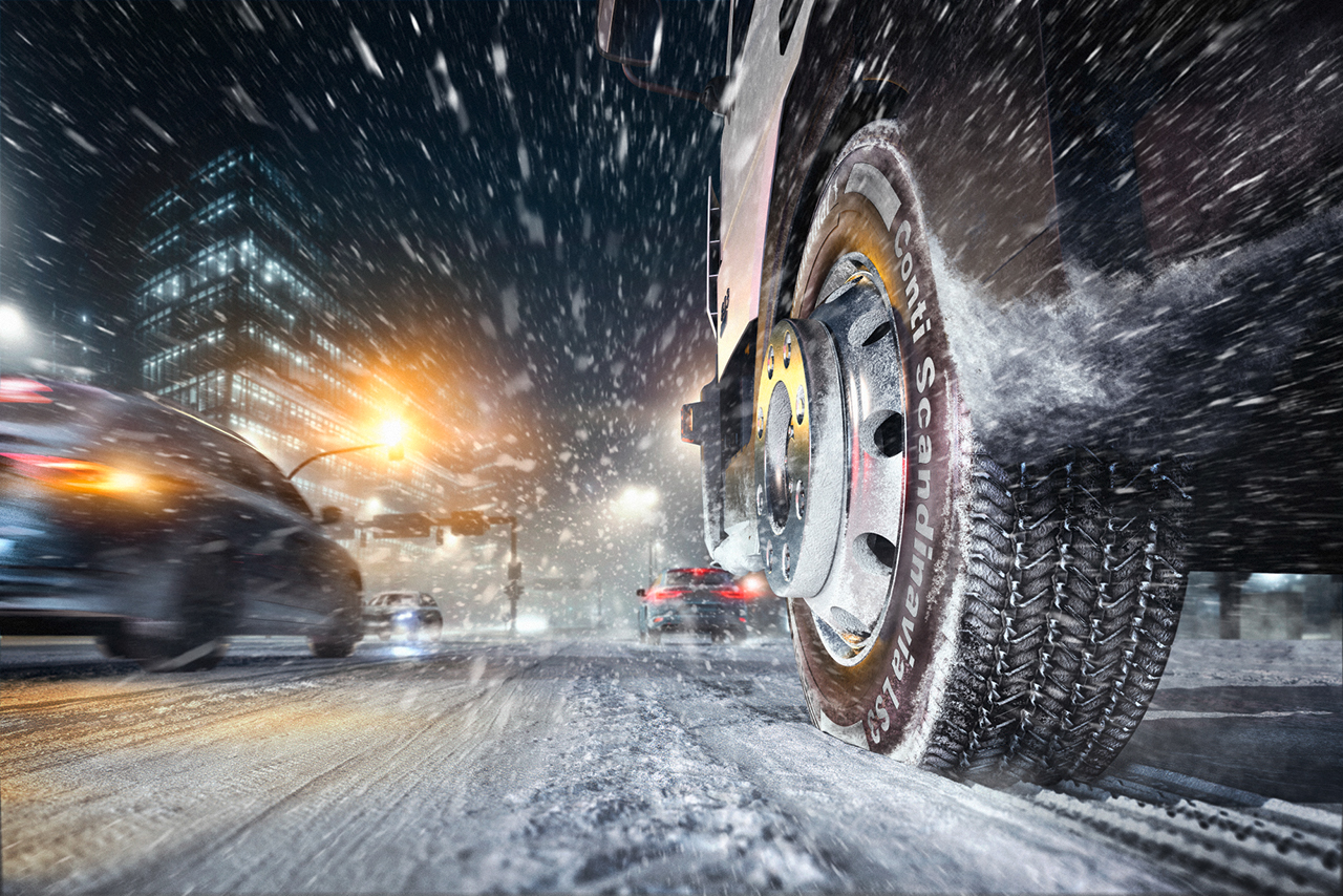Conti Scandinavia LS3 Truck driving in the city in snow